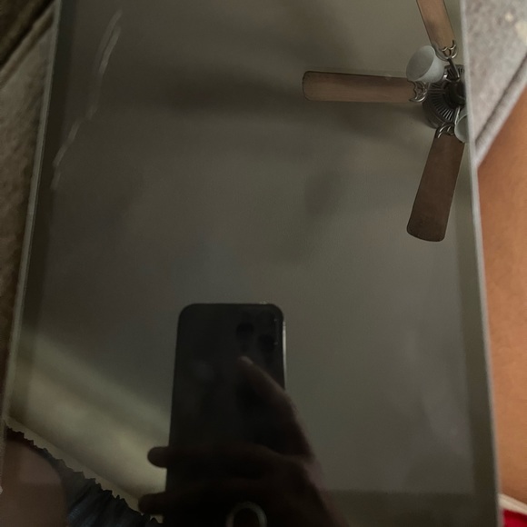 Screen slightly cracked but only the screen protector Can easily